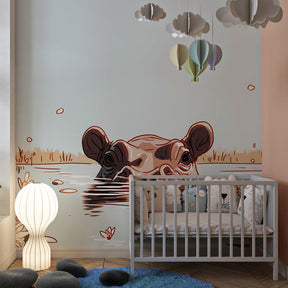 Hippo aquatic habitat mural wallpaper installed in bright kids playroom setting