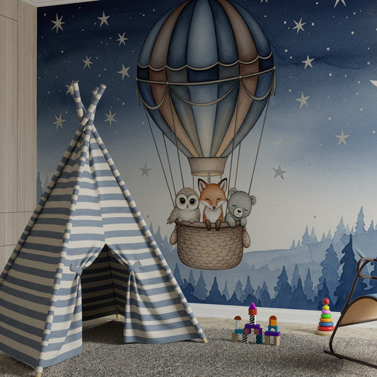 Kids-Mundo hot air balloon wall mural behind a toddler bed in a calm navy blue kids bedroom