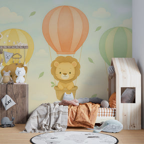 Children's bedroom featuring colorful hot air balloon mural wallpaper with animal characters