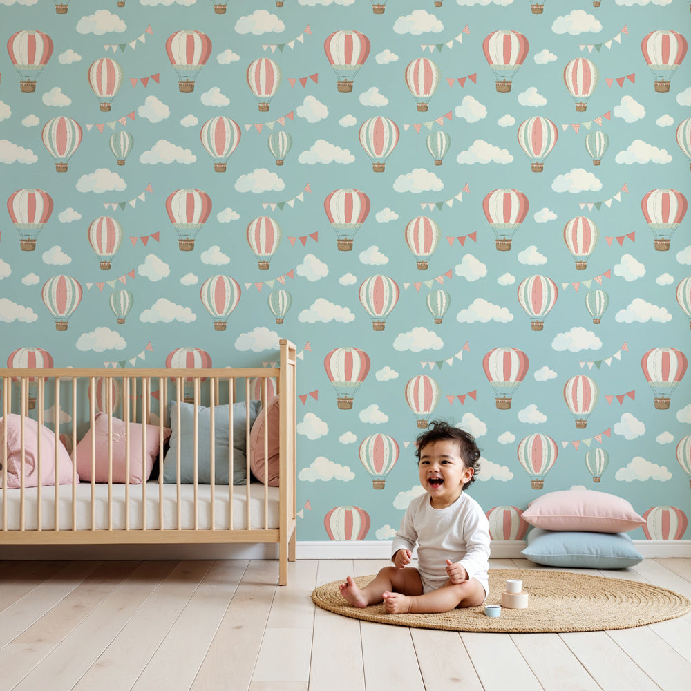 Hot air balloon mural wallpaper creating dreamy nursery atmosphere with soft blue sky theme by Kids-Mundo