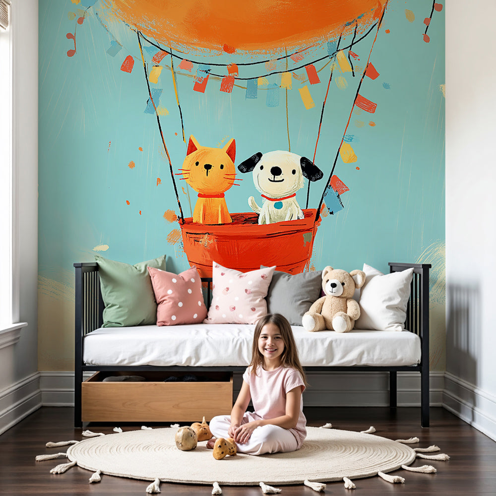 Hot air balloon mural wallpaper with cat and dog in colorful nursery by Kids-Mundo