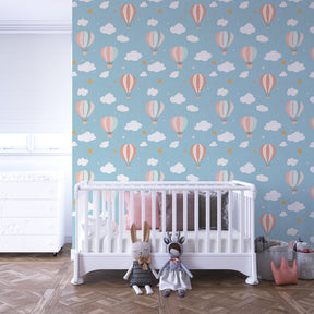 Pastel hot air balloon wallpaper creating magical playroom atmosphere for young adventurers
