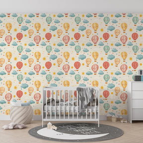 Sky adventure wallpaper with smiling balloons and clouds in colorful kids playroom