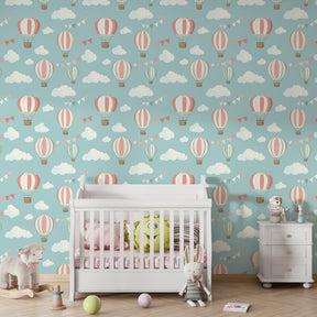 Sky adventure mural wallpaper featuring hot air balloons and clouds in bright children's playroom