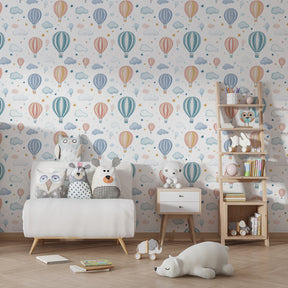 Whimsical hot air balloon mural wallpaper in bright kids playroom setting