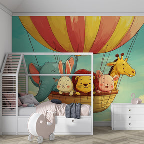 Playroom decorated with whimsical hot air balloon mural wallpaper showing animals on sky adventure