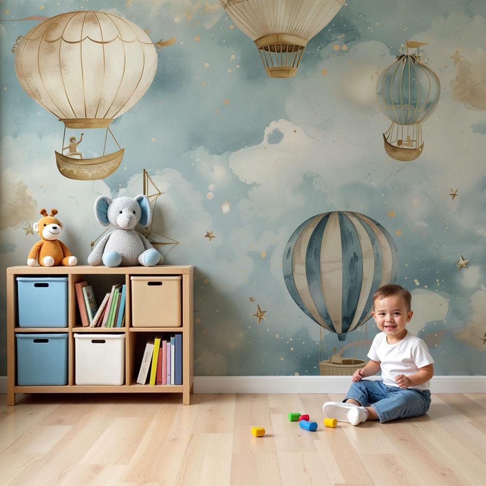 Kids-Mundo hot air balloon wall mural styled in a dreamy watercolour nursery with clouds.