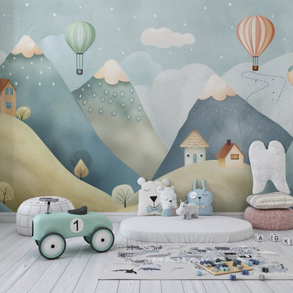 Mountain village wall mural with hot air balloons in a playroom, Kids-Mundo
