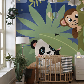 Nighttime safari wallpaper creating magical children's bedroom atmosphere with jungle theme
