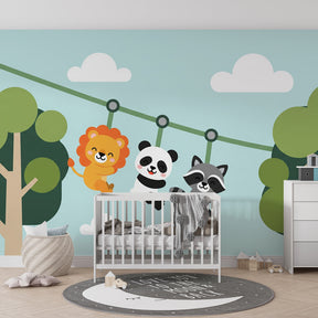 Baby nursery featuring jungle animals mural wallpaper with natural wood furniture
