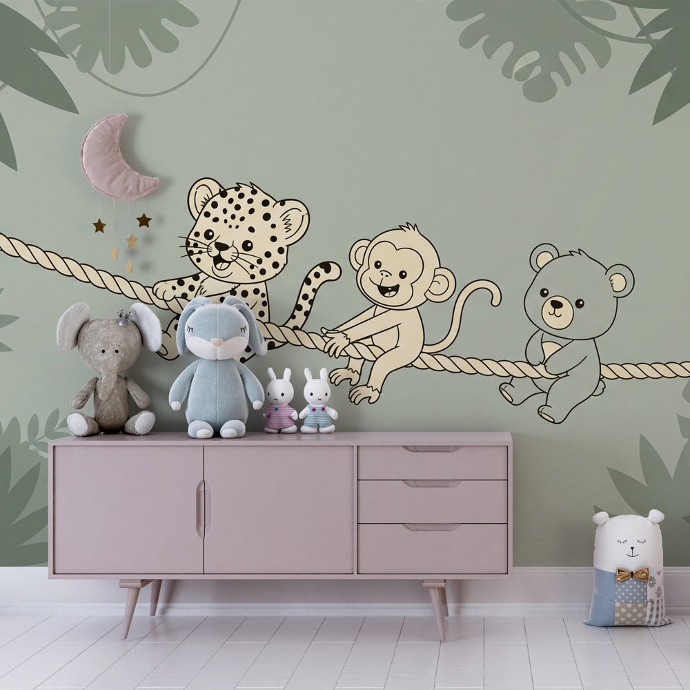 Baby nursery decorated with jungle animals mural wallpaper and natural wood accessories