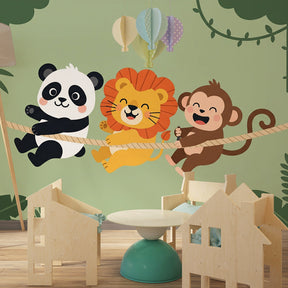 Playful jungle animals mural wallpaper creating adventure atmosphere in kids playroom setting