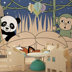 Tropical jungle mural wallpaper with cute animals transforming children's playroom space