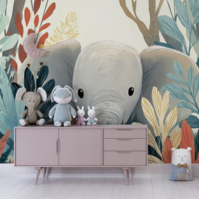 Children's jungle elephant wallpaper in bright playroom setting with natural wood furniture