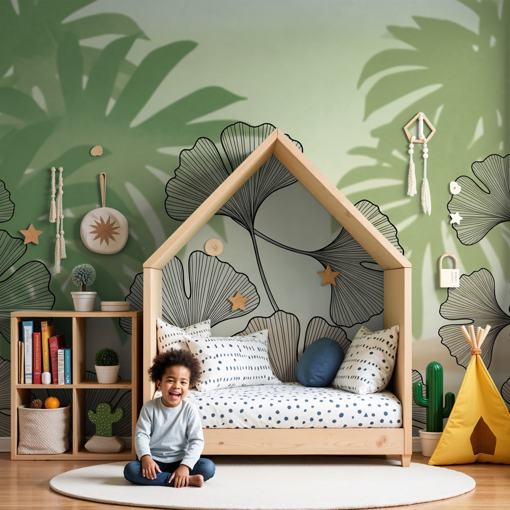 Delicate ginkgo leaves mural wallpaper creating serene jungle atmosphere in modern nursery by Kids-Mundo