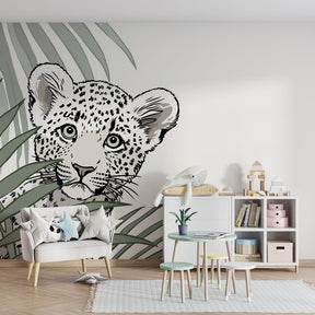 Leopard safari mural wallpaper in modern kids bedroom with natural wood furniture