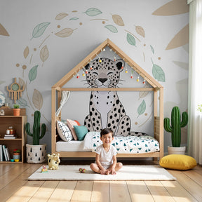 Jungle leopard mural wallpaper in modern nursery with natural wood crib by Kids-Mundo