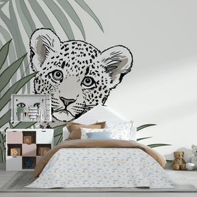 Tropical leopard wallpaper creating adventure-themed children's playroom by Kids-Mundo