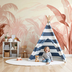 Pastel jungle mural wallpaper with tropical leaves in soft pink tones for modern nursery by Kids-Mundo