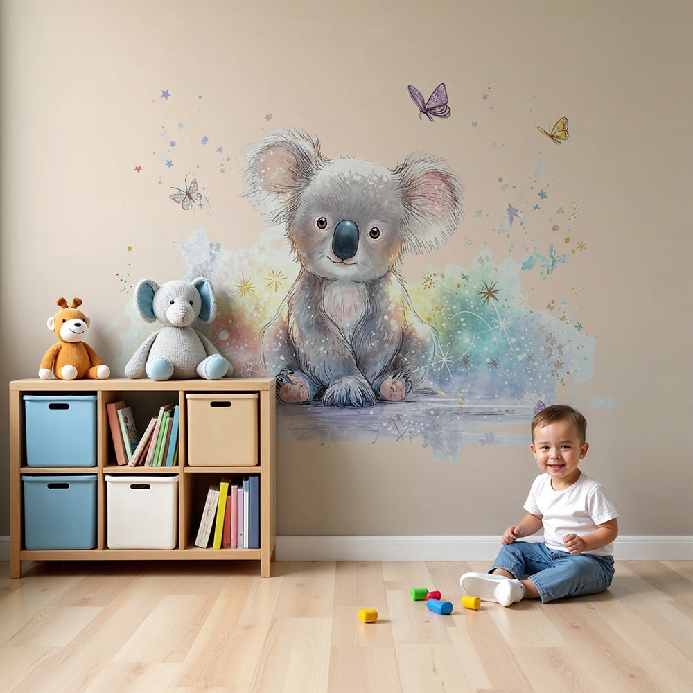 Kids-Mundo blush pink koala wall mural in a warm nursery with a cot and soft blanket