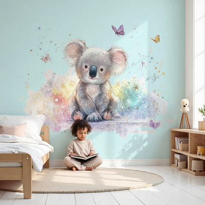 Kids-Mundo sparkly koala wall mural in a soft blue nursery with a cot and star mobile