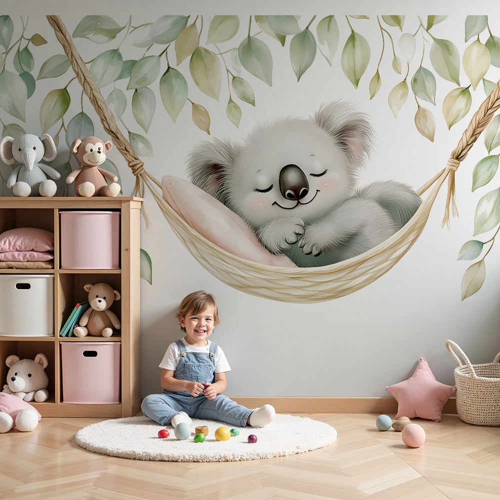 Kids-Mundo koala wall mural with eucalyptus hammock in a soft green nursery