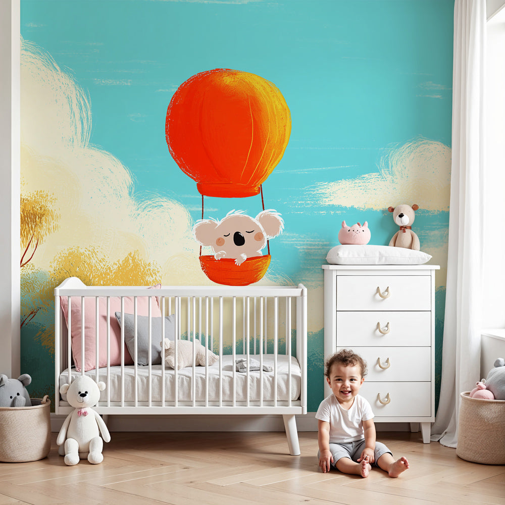 Koala hot air balloon mural wallpaper in modern nursery with wooden crib by Kids-Mundo