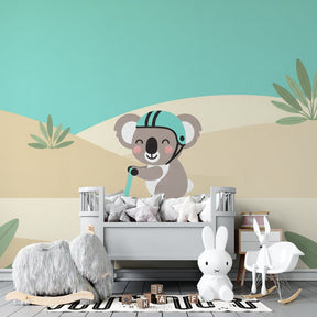 Charming koala on scooter mural wallpaper transforming toddler bedroom into adventure playground by Kids-Mundo