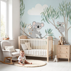 Koala mural wallpaper in peaceful nursery with natural wood crib by Kids-Mundo