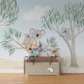 Nature-themed koala wallpaper transforming kids playroom with soft gray-green tones
