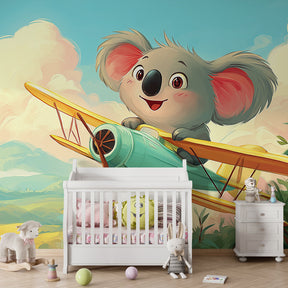 Flying koala adventure wallpaper creating magical kids bedroom atmosphere with vintage airplane theme