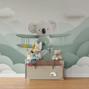 Adventure themed koala mural wallpaper transforming kids playroom with soft pastel colors