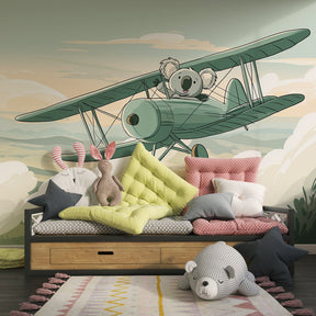 Koala pilot aviation mural wallpaper creating adventure atmosphere in children's playroom