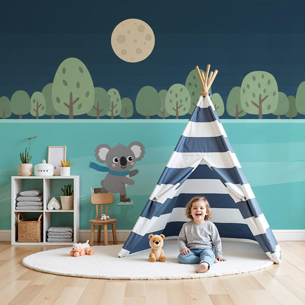 Koala skating mural wallpaper in modern nursery with moonlit winter scene by Kids-Mundo