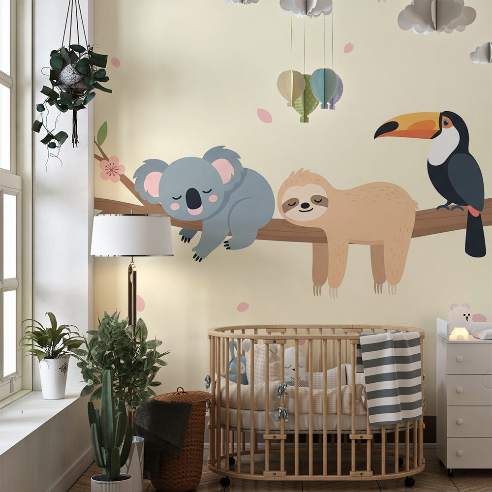 Kids-Mundo koala, sloth and toucan mural creating a cosy corner in a children's playroom.
