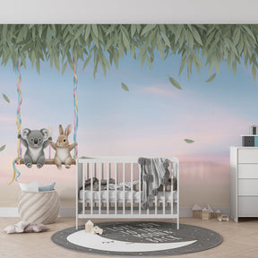 Gentle koala swing wallpaper decorating cozy toddler bedroom with soft pink and blue tones