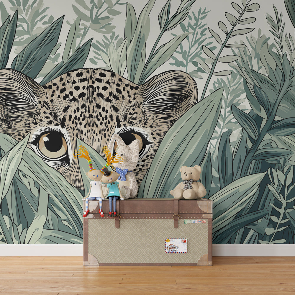 Kids-Mundo leopard cub wall mural featuring green leaves in a child's bedroom