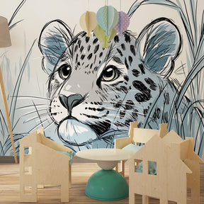 Curious leopard wallpaper creating safari adventure theme in kids bedroom