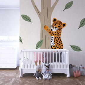 Safari leopard mural wallpaper with green foliage for kids room by Kids-Mundo