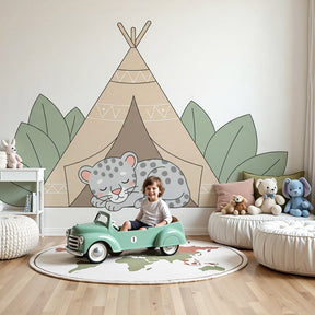 Leopard tipi mural wallpaper creating cozy safari nursery decor with natural wood furniture by Kids-Mundo