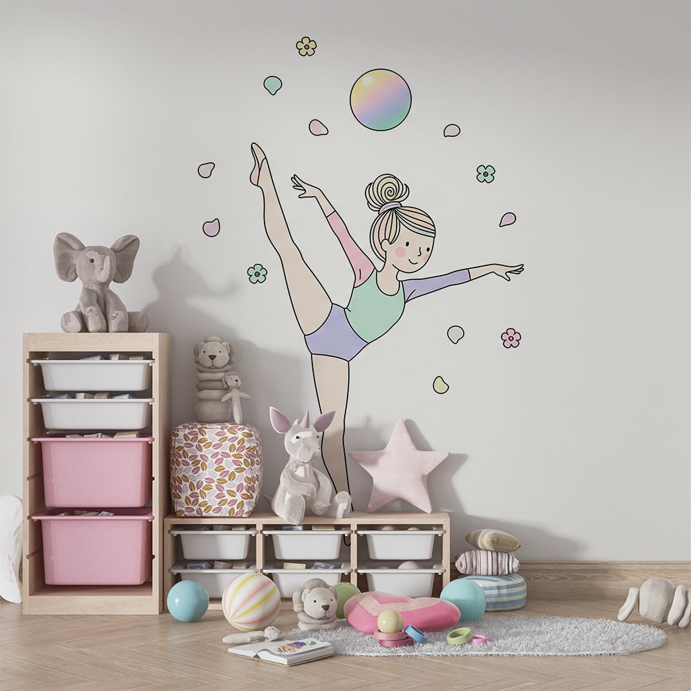 Kids-Mundo ballerina and petals wall mural shown on a feature wall in a girl's bedroom