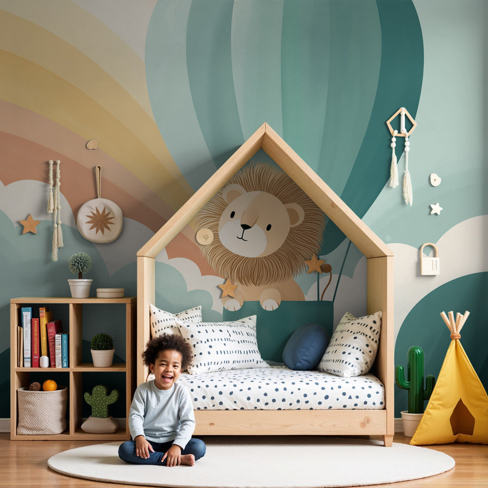 Kids-Mundo lion cub hot air balloon wall mural in a calm sky-blue nursery with a cot