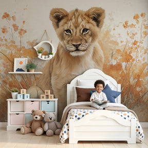 Lion cub mural wallpaper with autumn foliage decorating cozy nursery room by Kids-Mundo