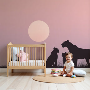 Lion family mural wallpaper creating safari-themed nursery with sunset colors by Kids-Mundo