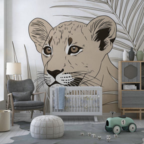 Baby lion and tropical foliage mural wallpaper in bright kids playroom by Kids-Mundo