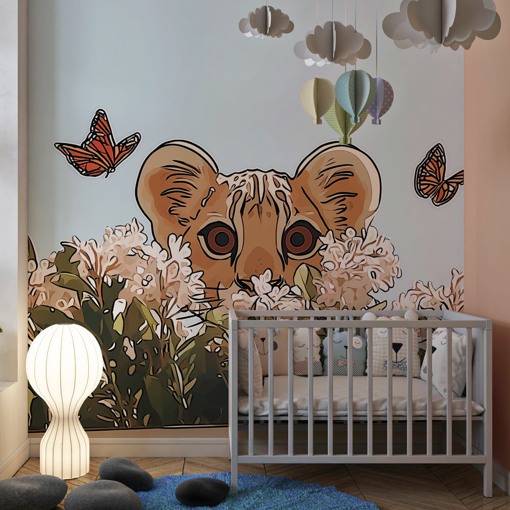 Safari themed mural wallpaper with lion cub and flowers decorating children's playroom