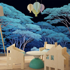 Blue tree forest wallpaper creating enchanted kids bedroom atmosphere with natural decor