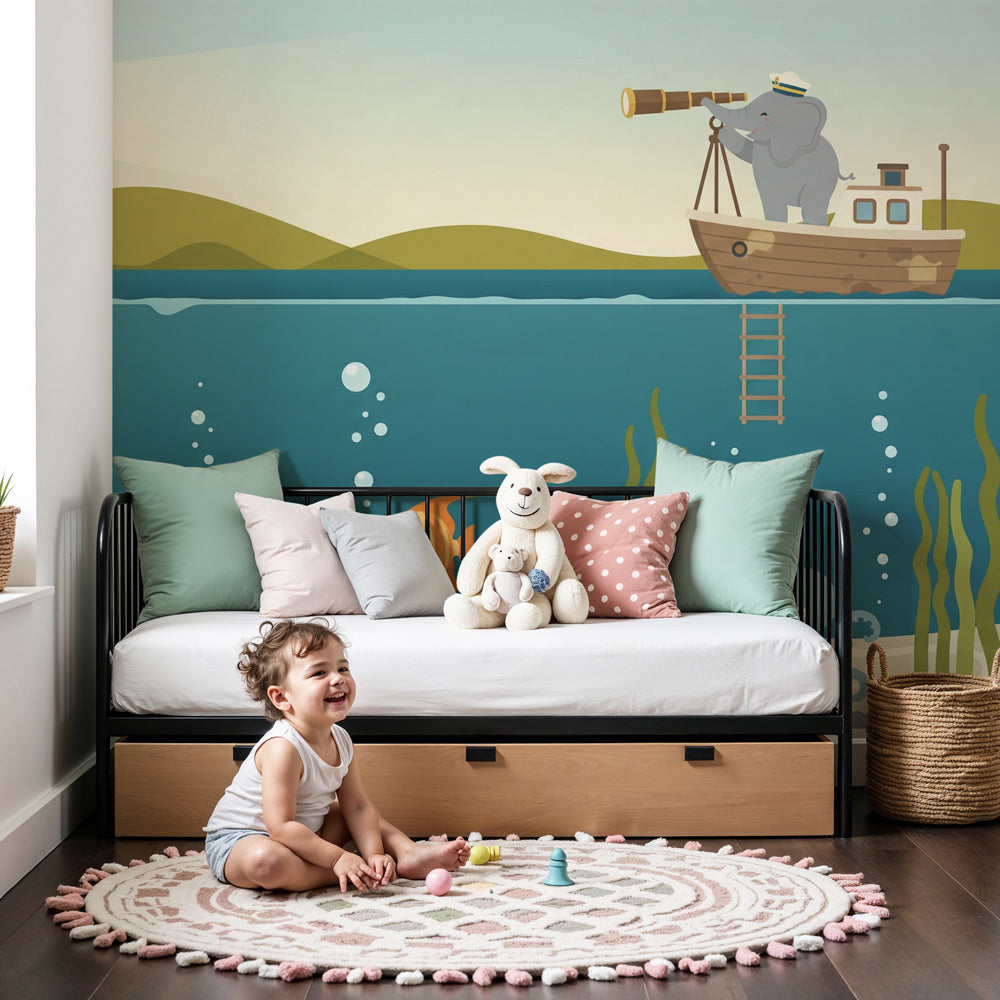 Maritime adventure mural wallpaper with explorer elephant in modern nursery by Kids-Mundo