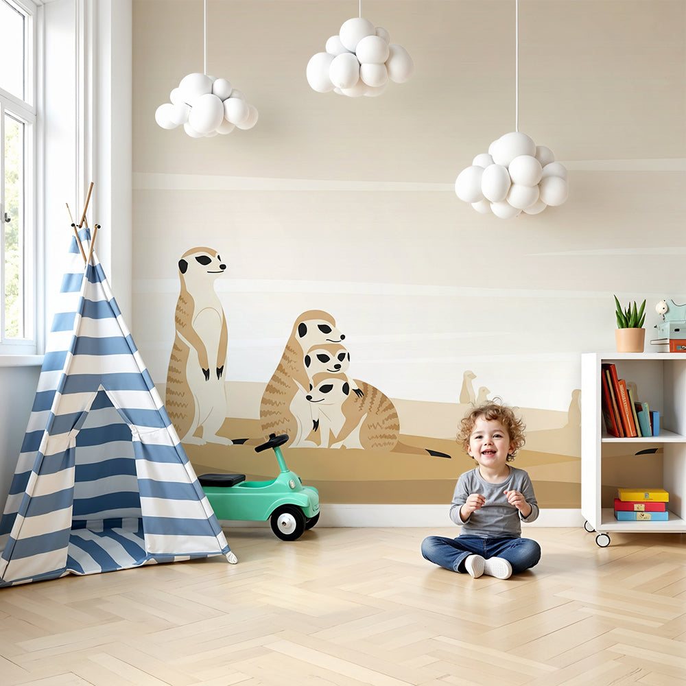 Kids-Mundo meerkat family sandy dune wall mural styled behind a cot in a warm beige nursery