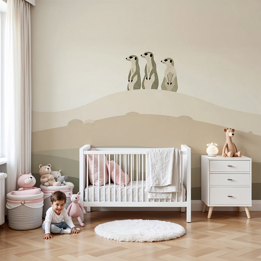 Kids-Mundo made-to-measure meerkat wall mural styled in a calm neutral nursery beside a wooden cot